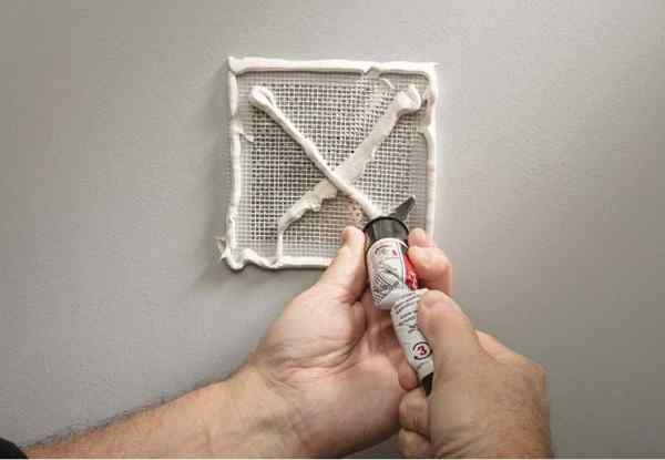 Outils cool la correction tout-en-1 pour à peu près n'importe quel trou dans le mur